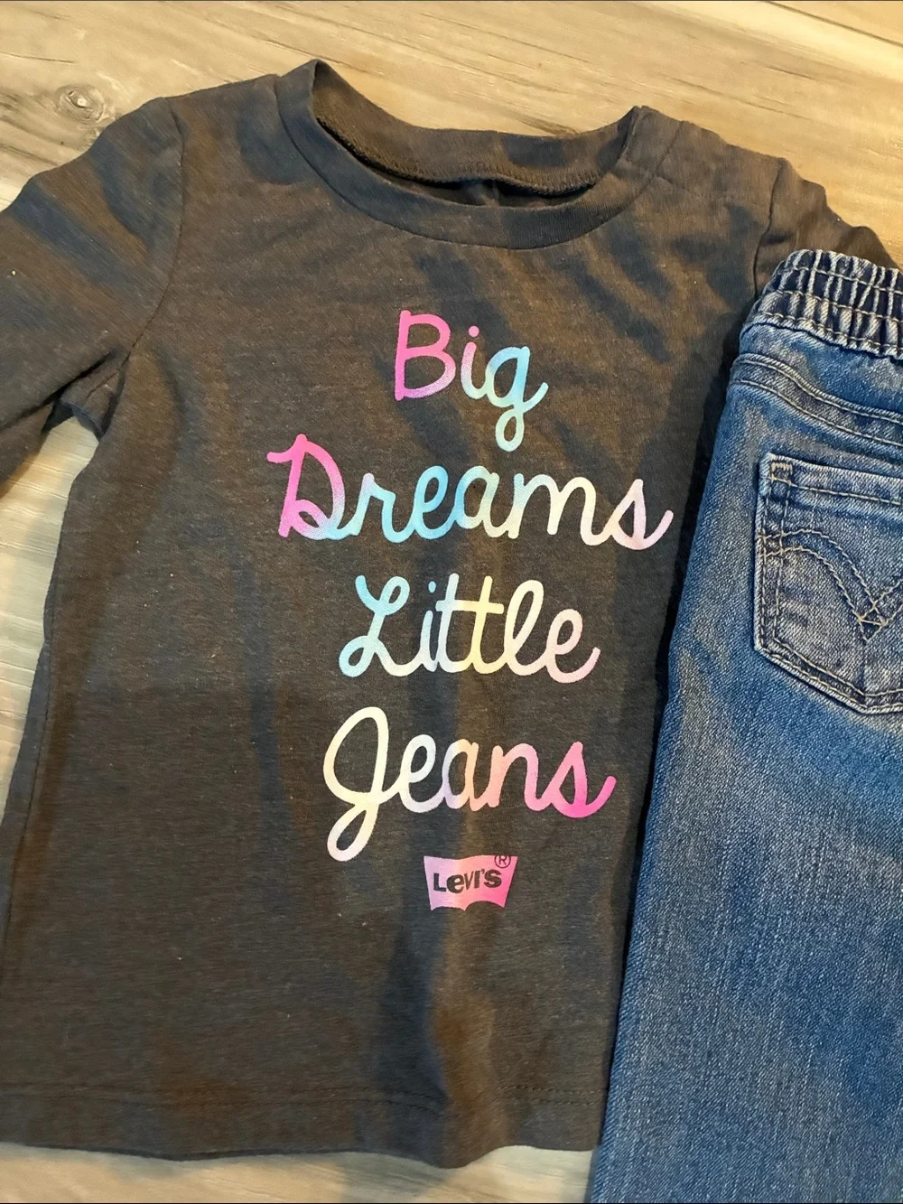 🩵 Levi's Charcoal Top with Multicolor Script & Blue Jeans Set